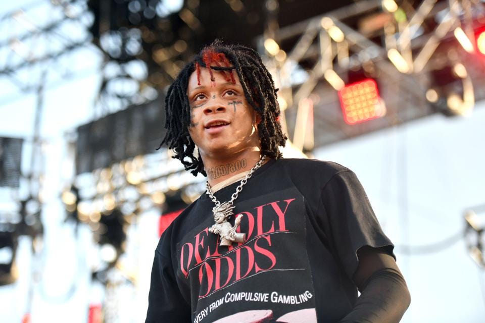 Trippie Redd Hosts A Christmas Toy Drive Dressed As The Grinch