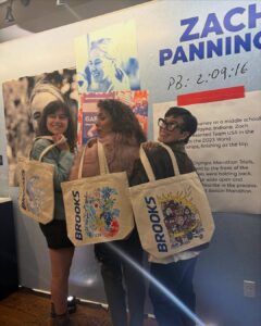 Victoria “ThirteenVic” DelValle Unveils Human-Focused Tote Design in Boston Marathon x Brooks Running Collaboration.