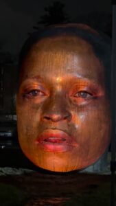 Phree Contributes Original Poem to Roxbury “Big Head” Sculpture Illumination.